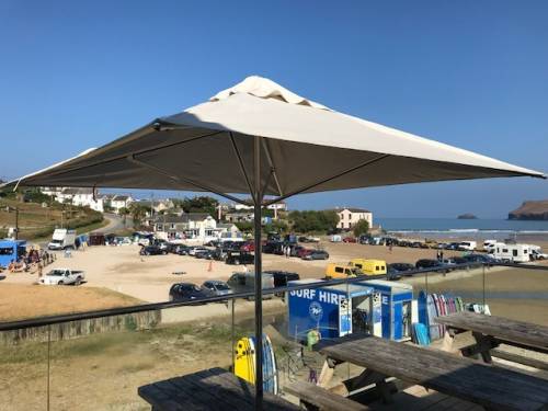 Installation Of 2 Shades Forever 2.1m Square Stainless Steel Umbrellas.